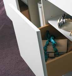 The cleverly designed tall chest conceals its secrets: drawers on two levels specially designed to hold small items.