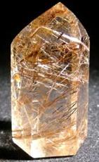 14 Aiguilles de rutile dans du quartz, Brésil (photo Alain Carion) Dendrites dʼoxyde de manganèse dans un cristal de quartz (Muséum de Genève) Parfois ces aiguilles sont courbes et on les