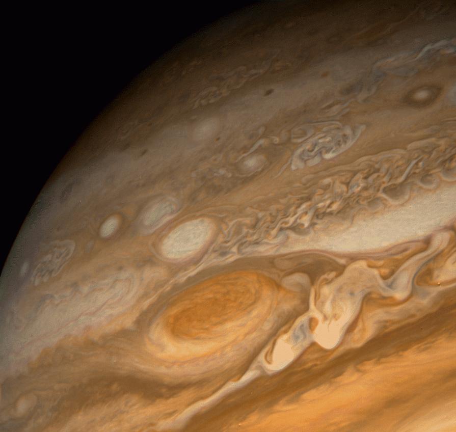 L'atmosphère de Jupiter : Elle est composée de 3 couches. La plus externe, probablement vers 100 km de profondeur, serait formée de nuages de glace d'ammoniac.