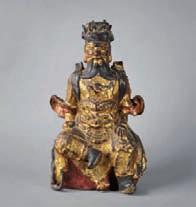 : 19 cm 200 / 300 592 Sujet en bronze de patine brune représentant le Bouddha assis en méditation sur un lotus, les mains en