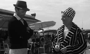 DOSSIER PAYS D AUGE ET CINÉMA Deauville, aout 1962 : Eddie Constantine et Louis de Funès, devant le Bar du Soleil dans Nous irons à Deauville, un film de Jacques Rigaud. Yul Brynner à Bonnebosq.