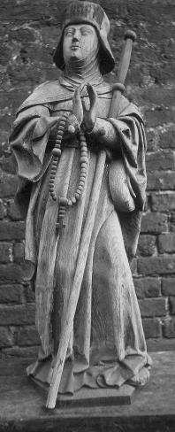 Sainte Renelde Femme vêtue d une pélerine portant