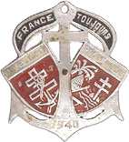 Insignes: Insigne de 1939 Symbolisme:1822 et 1936, dates de création du régiment Ancre de la coloniale, croix de la Légion d'honneur Le monde, zone d'action