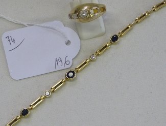 74 Bracelet Estimation : 200 / 300 Euros Adjugé(e) : 310 Euros Bracelet souple en or (saphirs, diamants serti