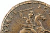 fixé sur l épaule. Nous proposons (n 1123) une médaille de François I er par Benvenuto Cellini dont voici la description : A/ FRANCISCVS. I. FR ANCORVM.
