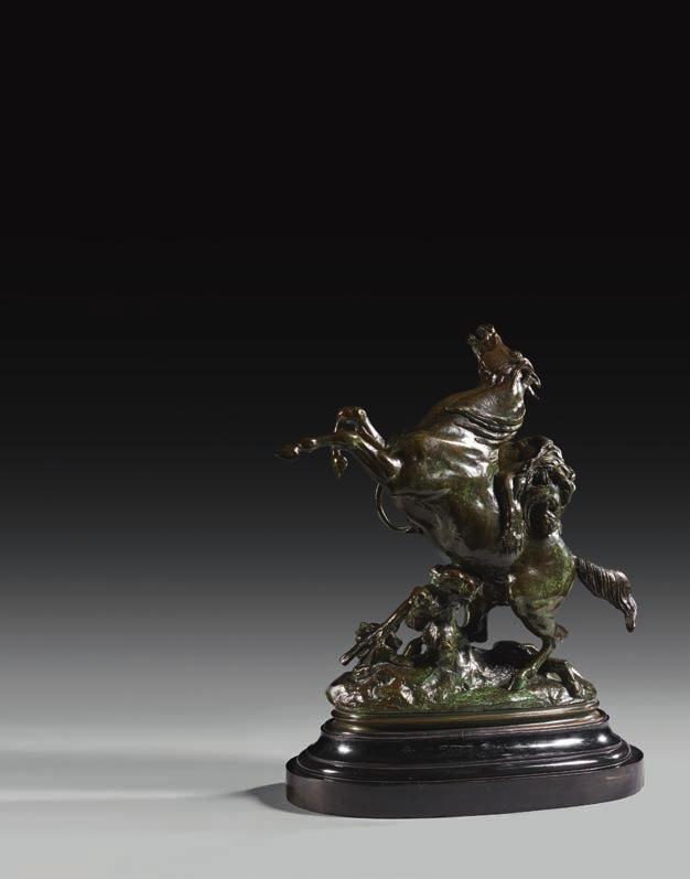 320 Collection d'un couple d'amateurs Antoine-Louis BARYE Paris, 1795-1875 Cheval surpris par un lion (seconde version) Bronze à patine brun vert richement nuancé Épreuve ancienne, atelier Barye,